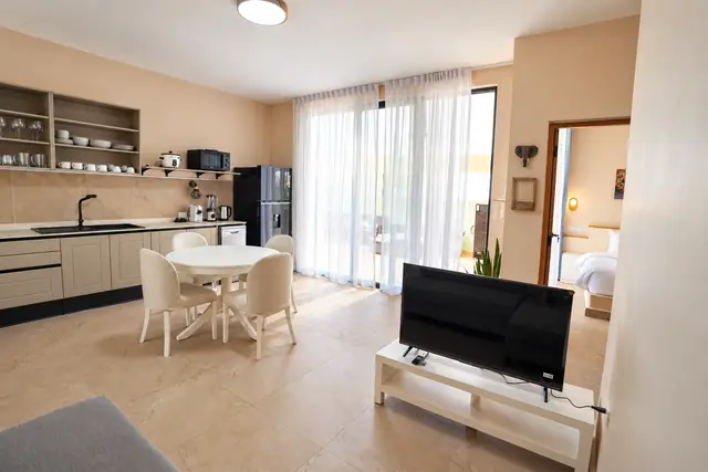 Bright modern living room with kitchen