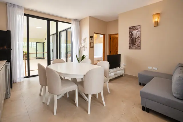 Living and dining area with terrace access