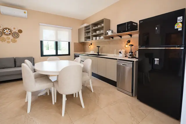 Kitchen and dining area in warm tones