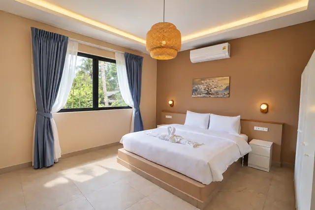 Warm minimalist bedroom with tropical view