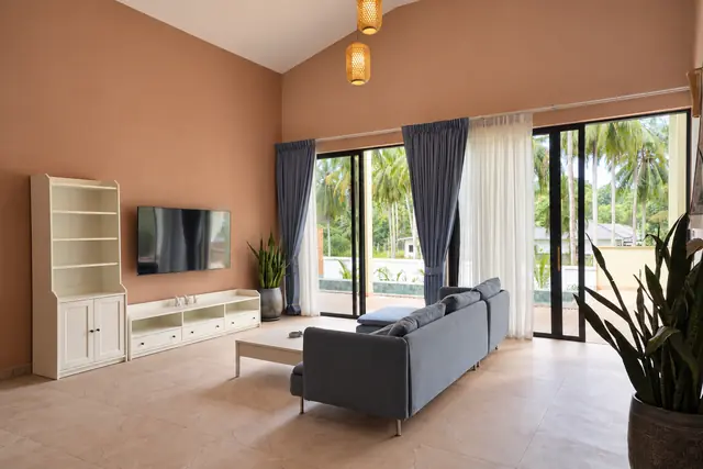 Bright living room with palm view