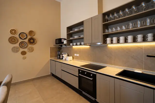 Warm kitchen with symmetrical mugs